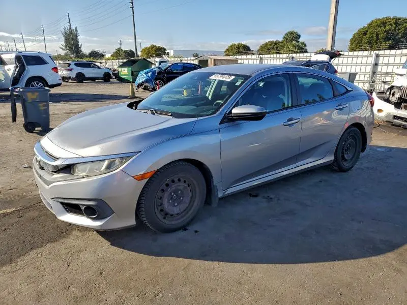 19XFC2F60JE023439