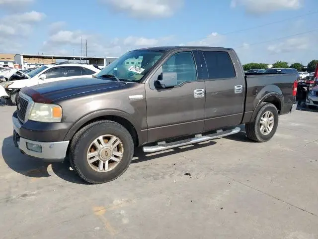 1FTPW12575KE37176