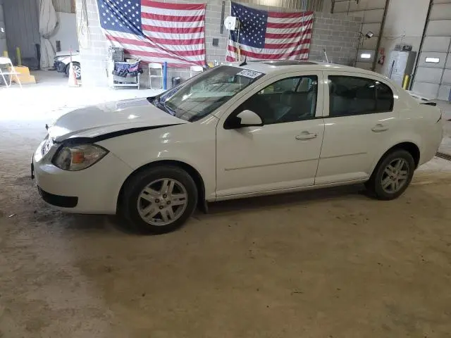 1G1AL54F457554348