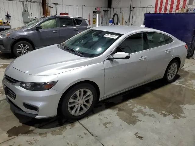 1G1ZD5STXJF211570