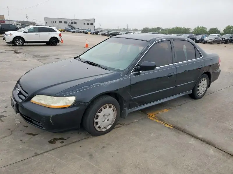 1HGCG554X1A076372