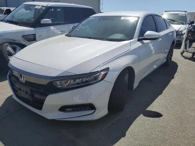 1HGCV1F38LA144000