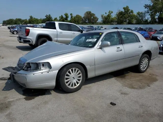 1LNHM83W14Y670780