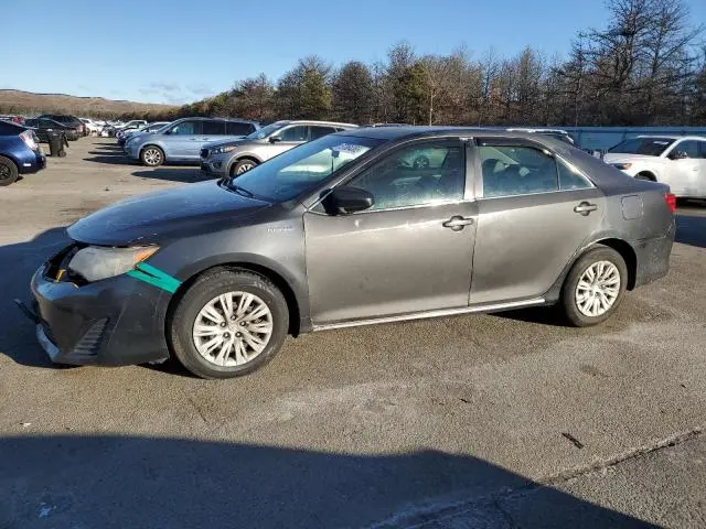 4T1BD1FK9CU015598