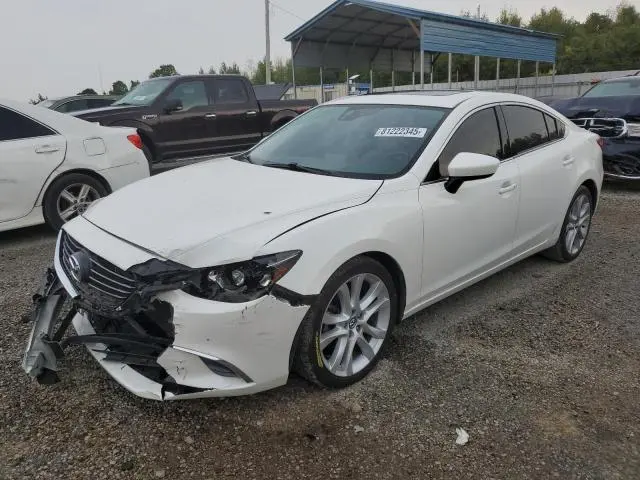 JM1GJ1T55G1434590