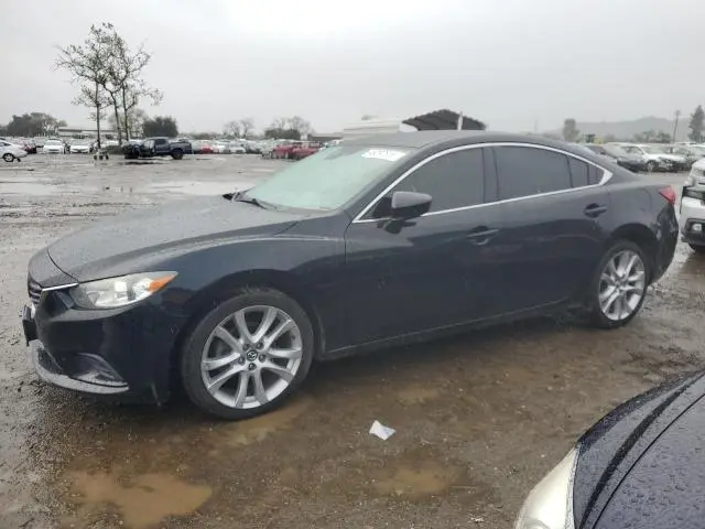 JM1GJ1T64E1122945
