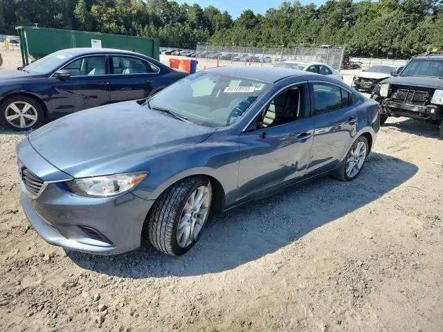 JM1GJ1V57E1103228