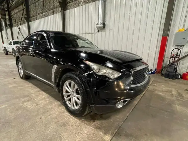JN8CS1MUXHM142276