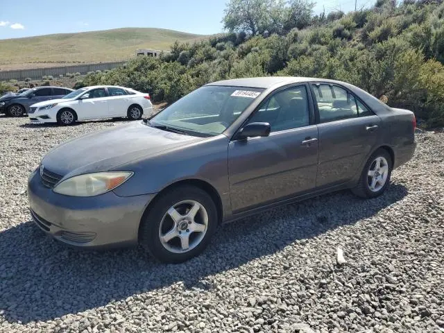 JTDBE32KX20020396