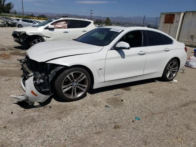 WBA4J1C57KBM18037